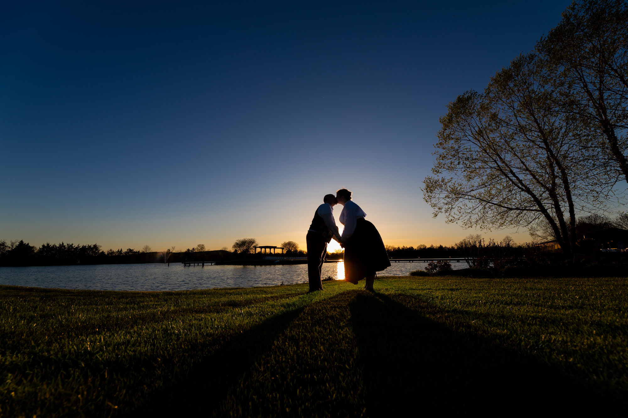 Wedding photography is a skilled profession, especially in Maryland and Virginia. A beautiful sunset wedding photo by husband and wife team Heather & Rob Wedding Photography.